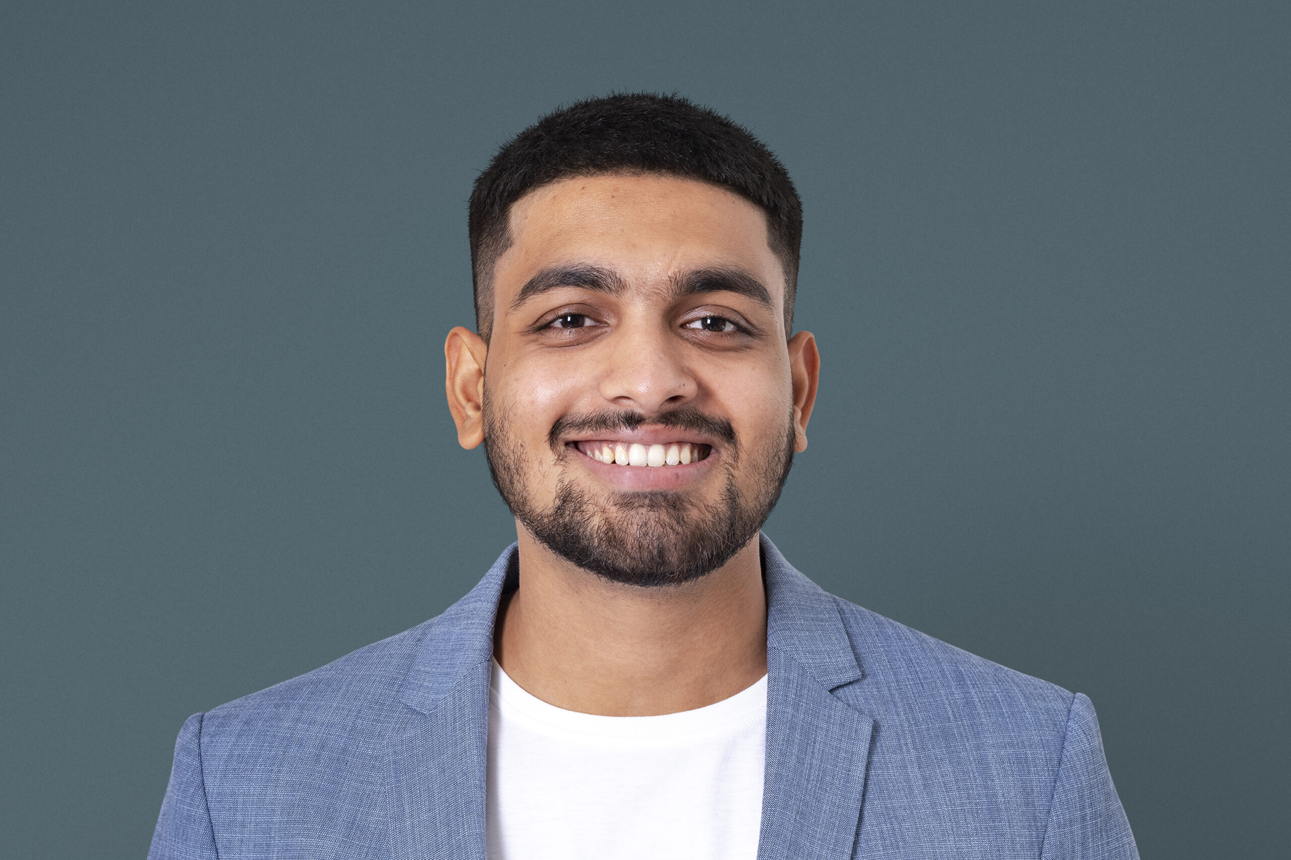 cheerful indian businessman smiling closeup portrait for jobs an